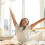 Woman waking up from restful sleep